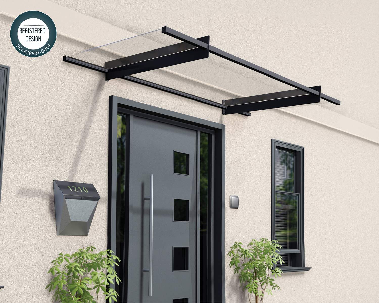 Sleek grey 2.1m x 0.9m Nancy door canopy with durable clear polycarbonate panels, designed to elevate and safeguard entrances