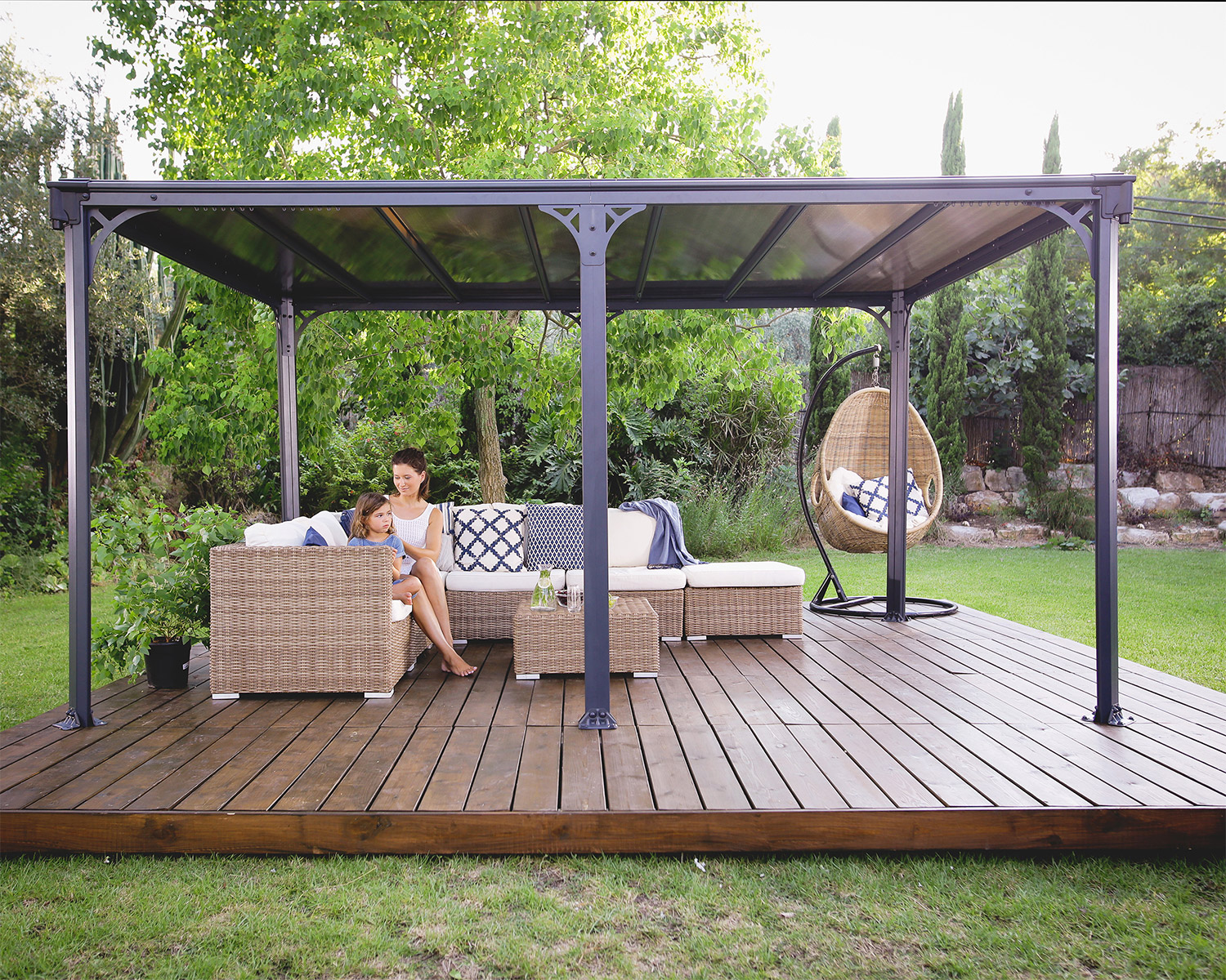 Milano 3.09m x 4.26m grey garden gazebo with a strong aluminum frame and HeatBlock polycarbonate roof panels, providing stylish outdoor shelter