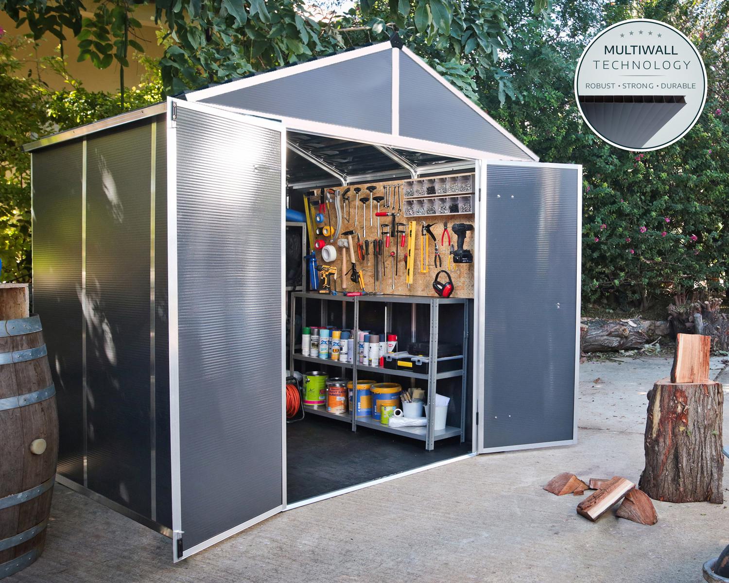 8ft x 8ft grey Rubicon garden shed with a sturdy aluminum frame and multiwall polycarbonate panels, set among blooming pink trees