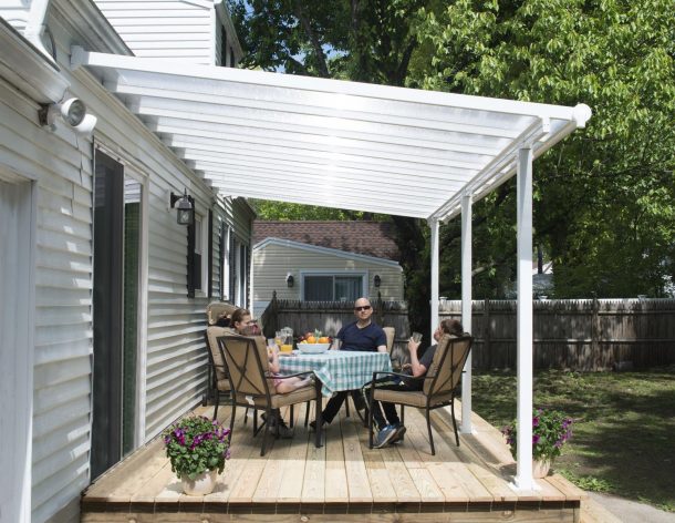 White Aluminium Patio Cover With Clear twin-wall polycarbonate roof panels on Deck Patio protect garden furniture